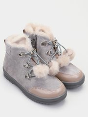 Gray-beige winter boots with pom-poms