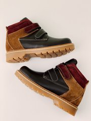 Brown leather and nubuck winter boots on wool felt
