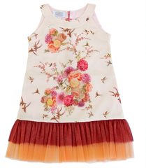 A milky dress with birds and flowers with a lush bottom on the front for a girl