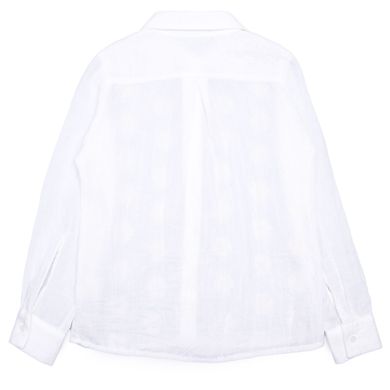 A milk-colored cotton blouse for a girl