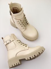 Beige winter leather boots on fur
