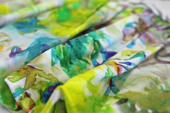 A white and yellow cotton skirt with a watercolor pattern for a girl