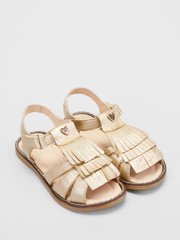 Gold leather sandals with fringes