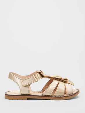 Gold leather sandals with fringes