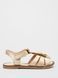 Gold leather sandals with fringes