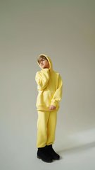 A stylish yellow suit is universal