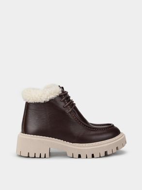 Dark brown leather winter boots fur-lined on fur