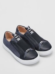 Dark gray slipons made of braided suede on a high sole are universal