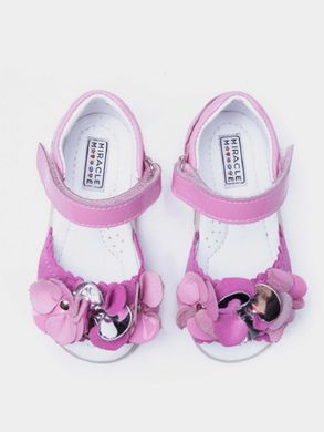 Pink leather sandals with floral decoration