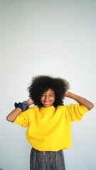 Stylish yellow sweatshirt for a girl