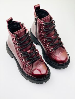 Burgundy winter leather boots on fur