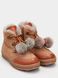 Brown winter boots with pom-poms