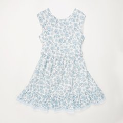 Blue cotton dress with a bow at the back and trim at the bottom for a girl