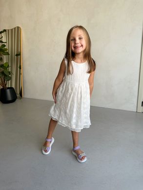 Milk cotton sundress with soft yellow flowers and bow on buttons at the back for girls