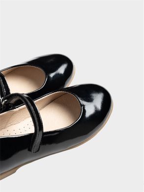 Black patent leather ballet flats on velcro