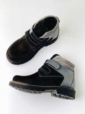 Black nubuck winter boots on wool felt