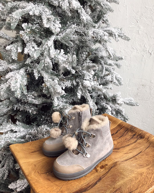 Gray-beige winter boots with pom-poms