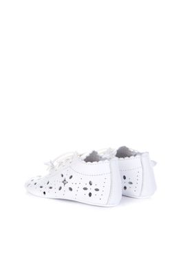 Children's white booties made of genuine leather with laces and perforations
